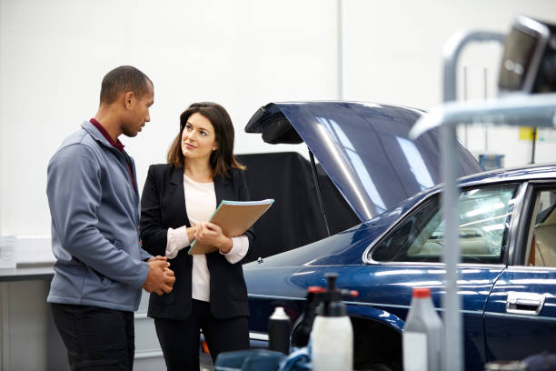istock Female supervisor talking to engineer in showroom 1132044864