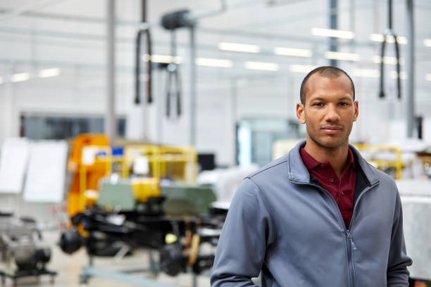 istock Confident engineer in car showroom 1132045069
