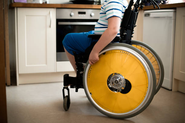 istock Young boy in a wheelchair 1132050499