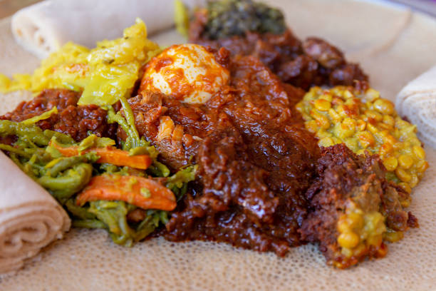 istock Injera with an assortment of toppings 1132051638