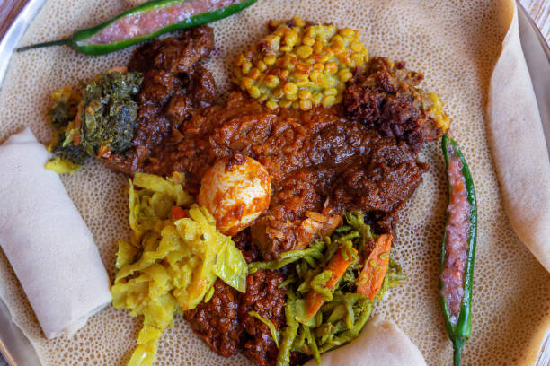 istock Injera with an assortment of toppings 1132051644