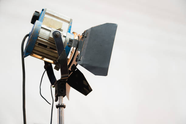 istock Continuous light source on studio set. Film industry equipment, electric spotlight lamp. 1132055773