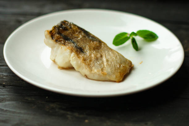 istock Fish, fried seafood (white fish on the plate). Food background 1132055880