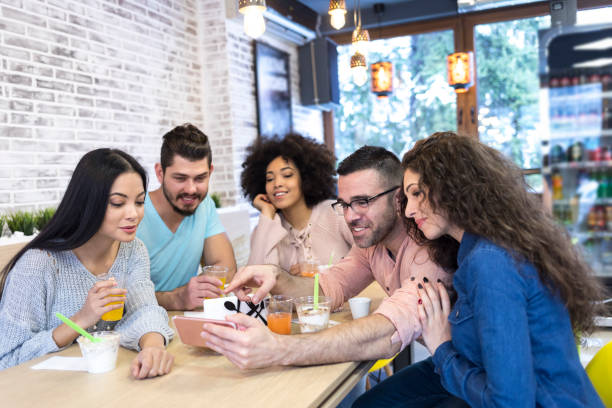 istock Coworkers having fun and taking selfie after work 1132060955