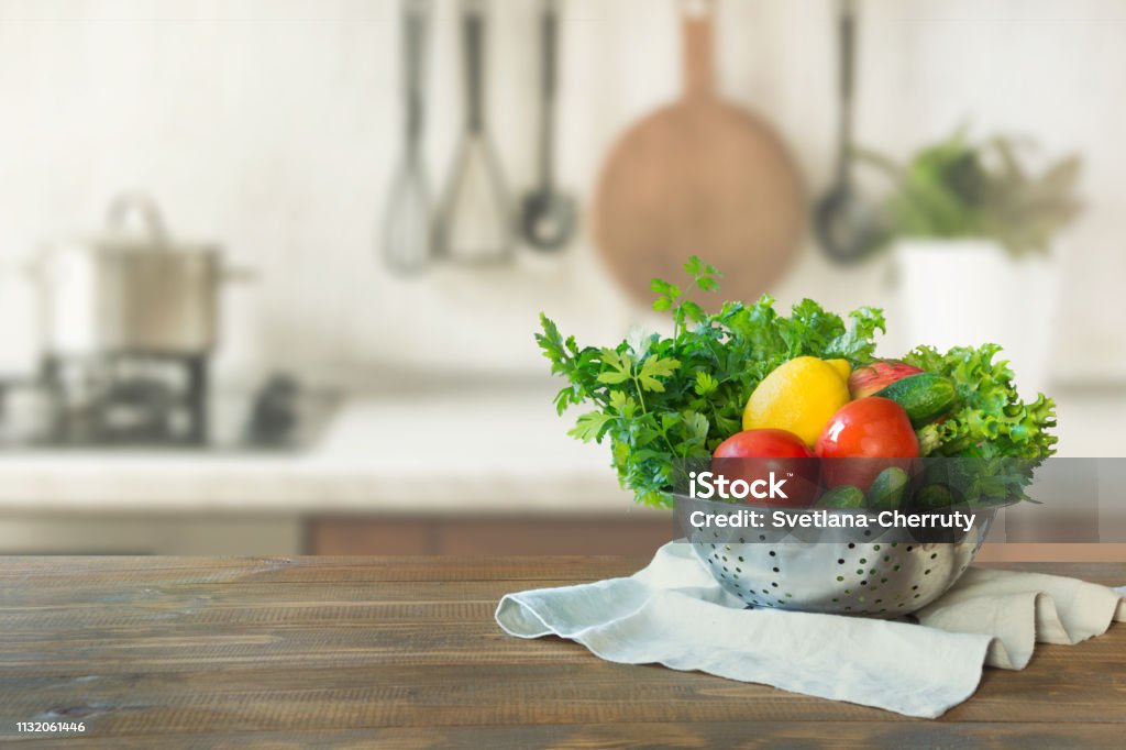 Modern kitchen with fresh vegetables on wooden tabletop, space for you and display products. Blurred background. Modern kitchen with fresh vegetables on wooden tabletop, space for you and display products. Vegetable Stock Photo Modern kitchen with fresh vegetables on wooden tabletop, space for you and display products. Blurred background. Modern kitchen with fresh vegetables on wooden tabletop, space for you and display products. Vegetable Stock Photo