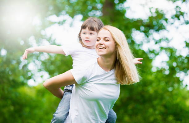 istock mom and daughter, fun, play 1132066163