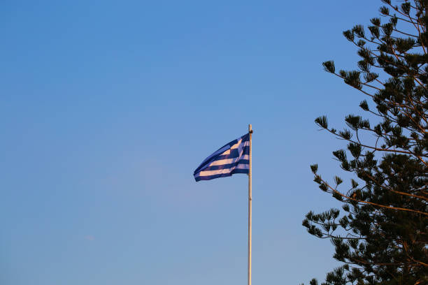 istock Flag of Greece on blue sky 1132066361