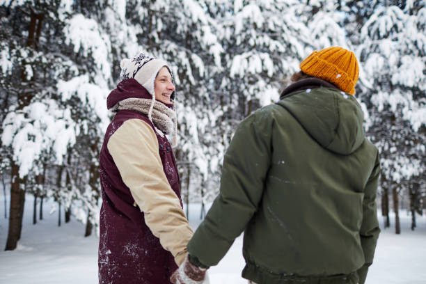 istock Couple in Winter Woods 1132068838