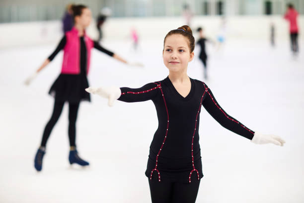 istock Little Girl Figure Skating 1132070974