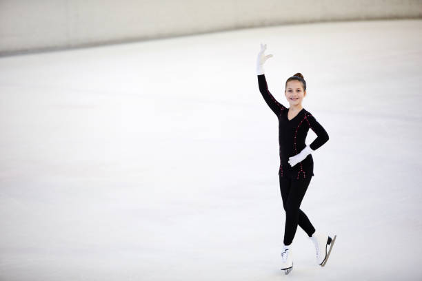 istock Girl Posing on Skating Rink 1132070991