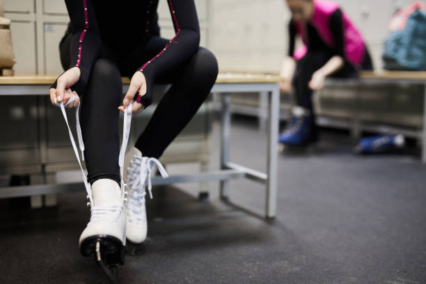 istock Unrecognizable Girl Tying Ice Skates 1132071005