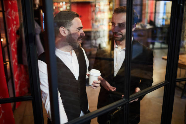 istock Two Gentlemen by Window in Restaurant 1132071588