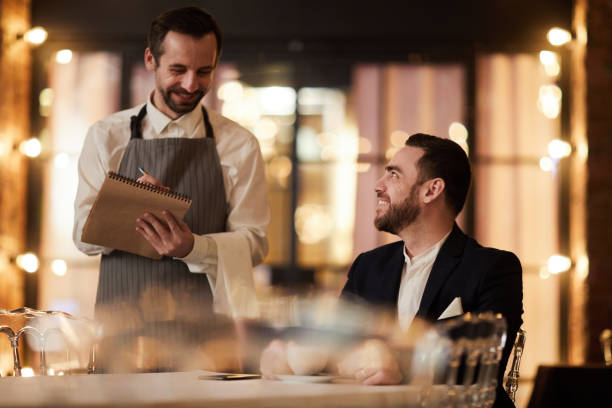 istock Guest Ordering Food in Restaurant 1132071630