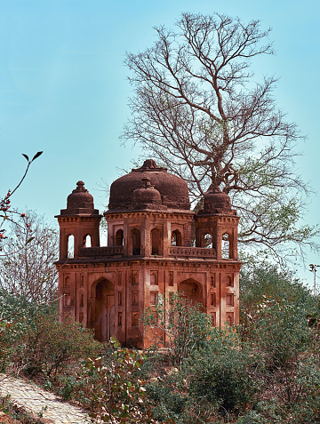 Fatehpur Sikri, located in the Agra District of Uttar Pradesh, India, is a well-preserved example of Mughal architecture. Established by Emperor Akbar in 1571, the city served as the Mughal Empire's capital for a brief period. Key architectural features include the Buland Darwaza, a grand gateway standing at 54 metres, and the Tomb of Salim Chishti, renowned for its intricate marble lattice work. This UNESCO World Heritage site offers insights into the political, cultural, and aesthetic sensibilities of the Mughal era.