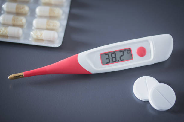 istock Fever thermometer on the desk, 38 degrees Celsius 1132073490