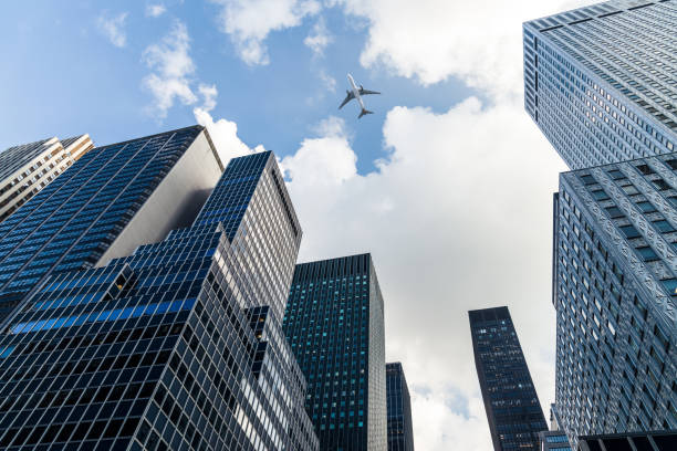 istock Plane Flying Over the Skyscrapers, Manhattan, NYC 1132073735