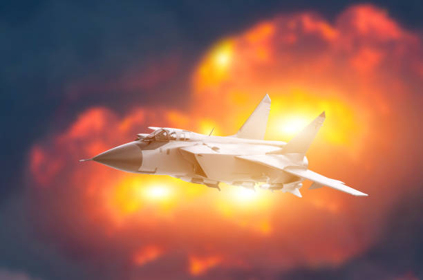 istock Fighter jet aircraft flying backdrop of a powerful explosion. War strike concept 1132074278