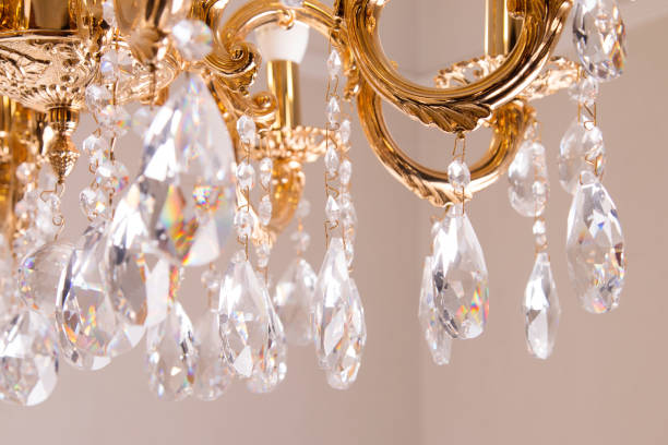 istock Beautiful vintage crystal chandelier hanging on a ceiling. 1132075062