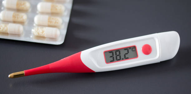 istock Fever thermometer on the desk, 38 degrees Celsius 1132075257