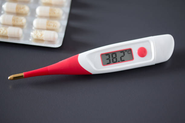 istock Fever thermometer on the desk, 38 degrees Celsius 1132075258