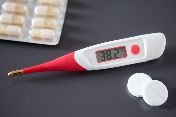 istock Fever thermometer on the desk, 38 degrees Celsius 1132075261