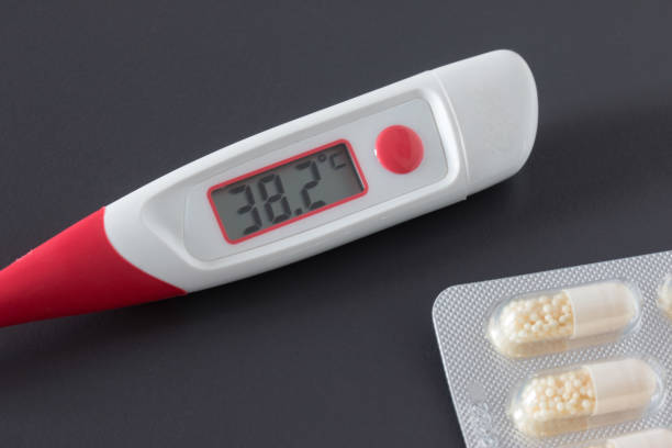 istock Fever thermometer on the desk, 38 degrees Celsius 1132075267