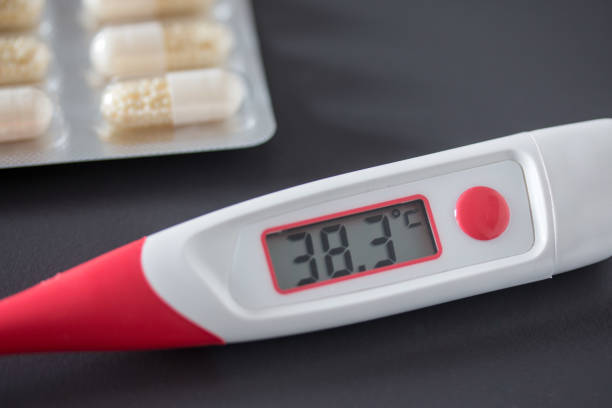 istock Fever thermometer on the desk, 38 degrees Celsius 1132075426