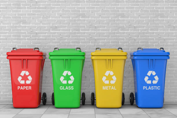 istock Red, Green, Yellow and Blue Recycle Bins with Recycle Symbol. 3d Rendering 1132076076