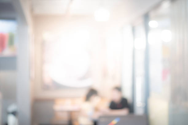 istock Abstract blurred restaurant background. Blurry cafe or coffee shop with dining tables, chairs and other decorations. Blur backdrop for design element. Food and beverage concept. 1132079618