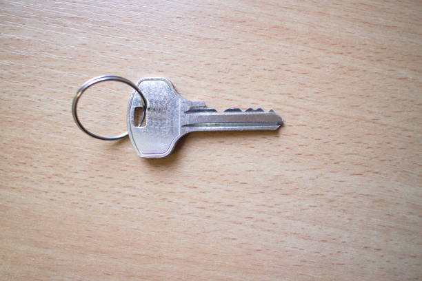 istock door key on the office desk 1132079842