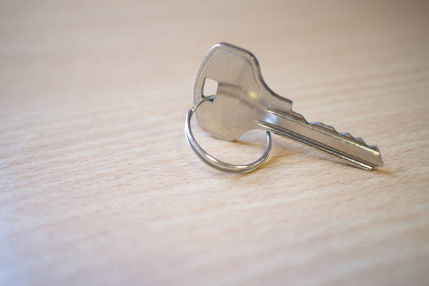 istock door key on the office desk 1132079915