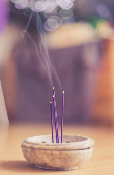 istock Smoking and smelling joss sticks at home, feng shui; Copy space 1132079957