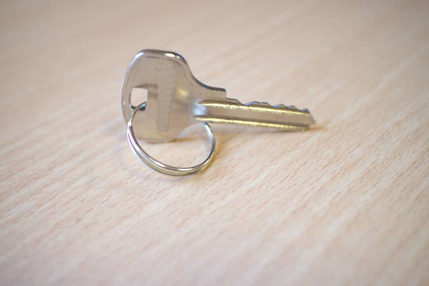 istock door key on the office desk 1132079968