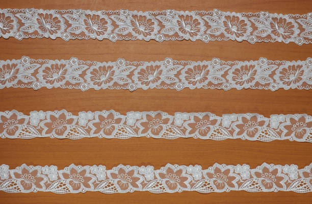 istock White lace on wooden background 1132080301
