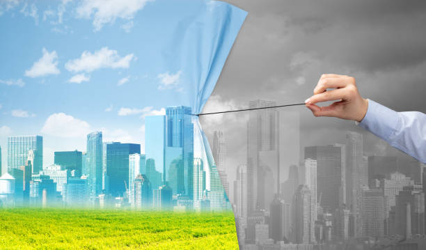 istock hand pulling green cityscape curtain to gray cityscape 1132080734