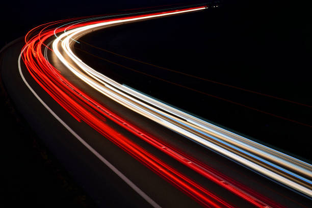 istock traffic on the highway at night 1132082469