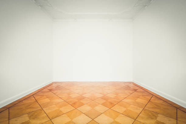 istock empty room with wooden parquet floor refurbished apartment 1132083470