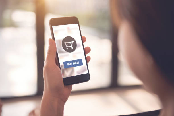 istock Online payment. Woman using mobile smartphone for online shopping. 1132086558