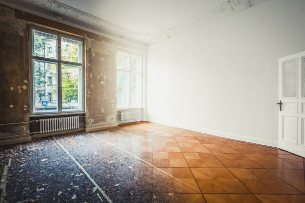 istock flat renovation, empty room before and after refurbishment or restoration photo merge - 1132086978