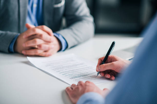 istock Signing contract on a meeting, close-up. 1132086981