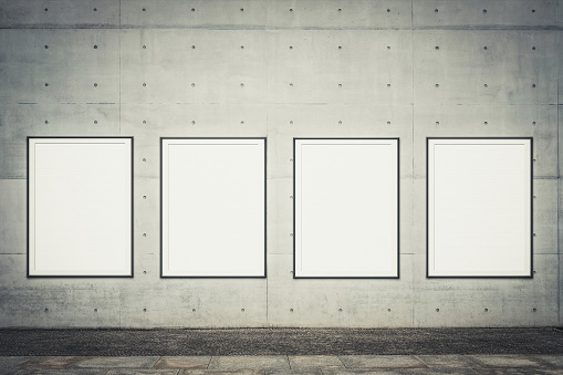 row of framed poster / blank poster frames near sidewalk mock up for advertising