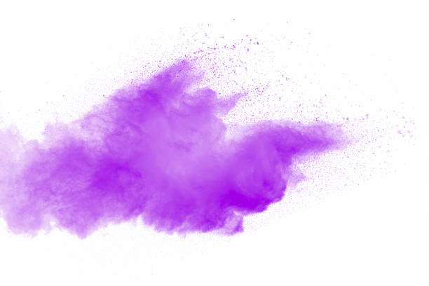 istock Explosion of violet dust on white background. 1132088933