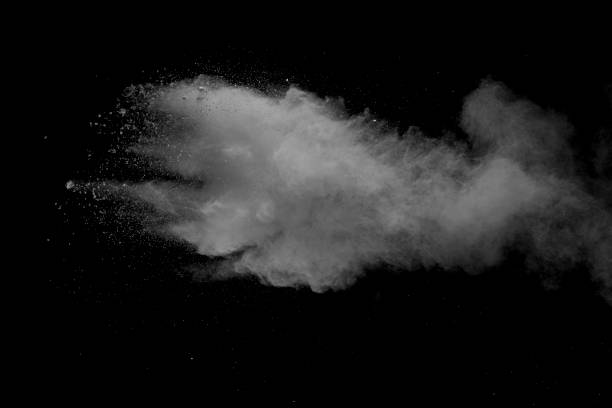 istock Explosion of white dust on black background. 1132089172