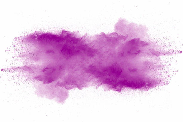 istock Explosion of violet dust on white background. 1132089325