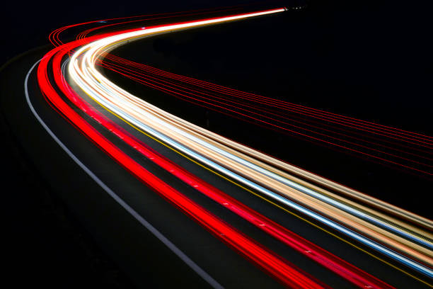 istock traffic on the highway at night 1132090240
