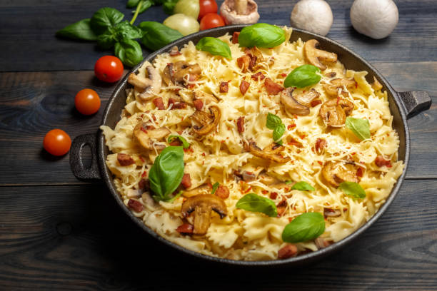 istock casserole  pasta with mushrooms, sausage and cheese 1132091894