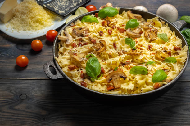 istock casserole  pasta with mushrooms, sausage and cheese 1132092019