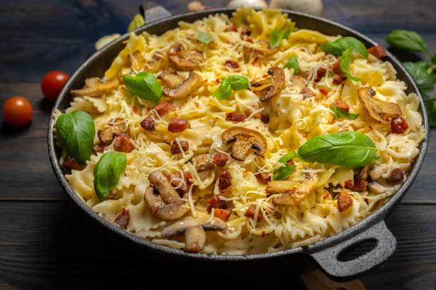 istock casserole  pasta with mushrooms, sausage and cheese 1132092031