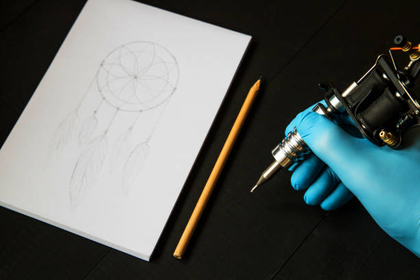 istock tattoo accesories with tattoo sketch. 1132092047