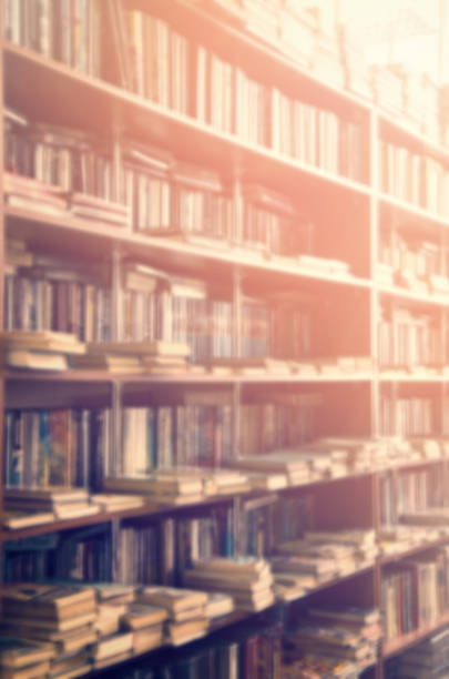 istock blurred bookshelf in library for your background design 1132093786